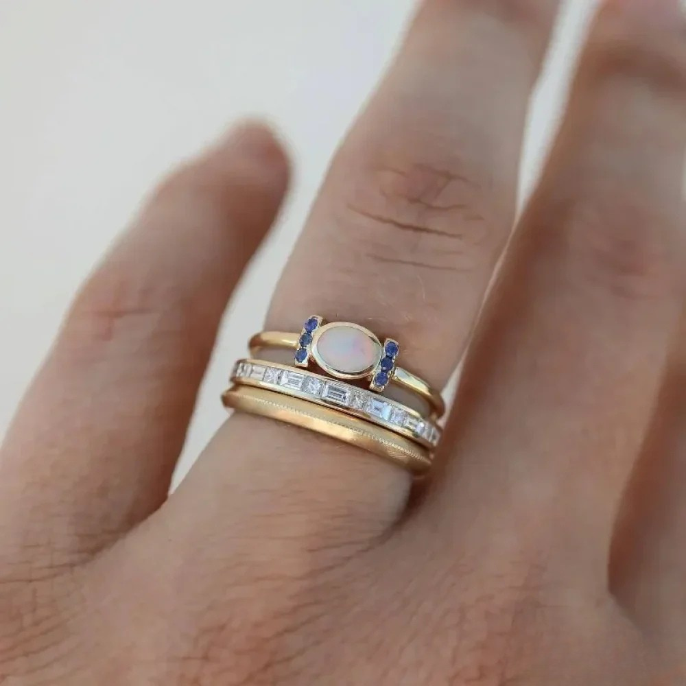 Sett med vintage gull opalringer